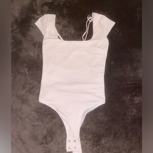 Small GARAGE pink crossback bodysuit